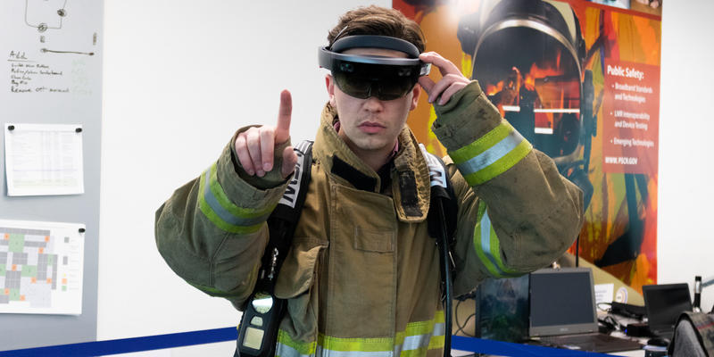 A firefighter wearing augmented reality glasses
